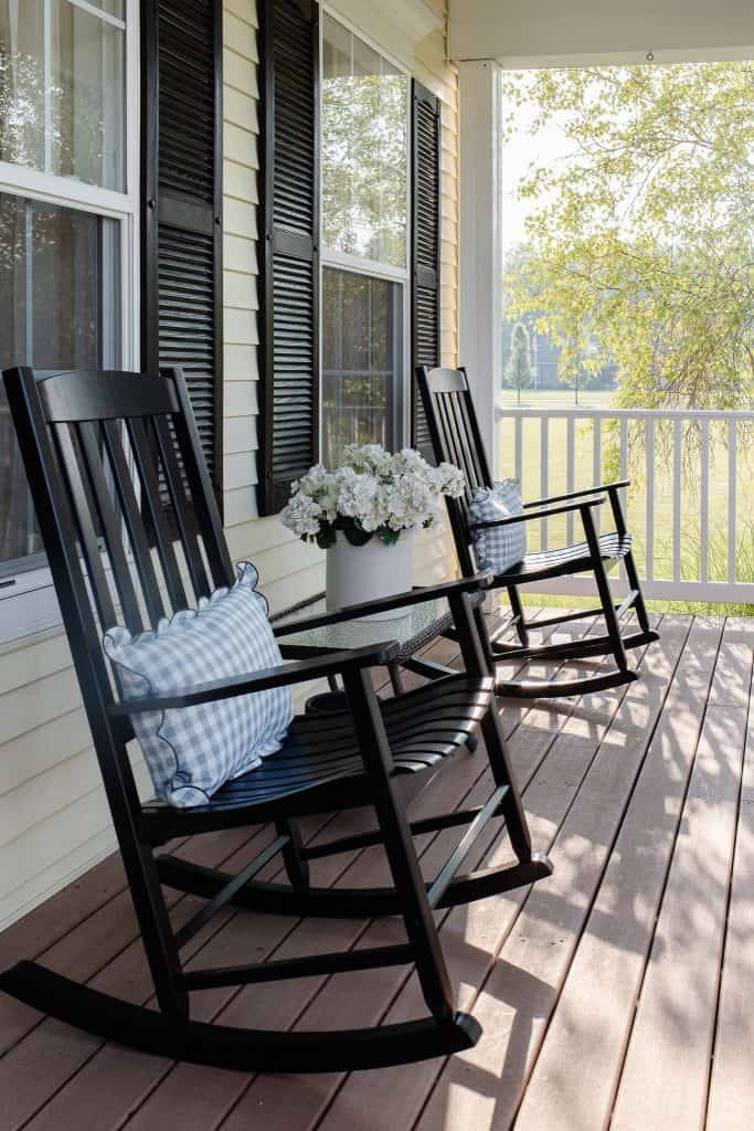 black rocking chairs on front porch