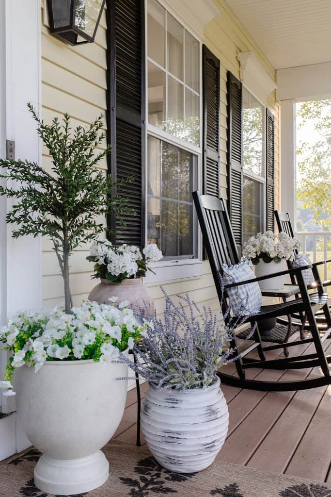 front porch planters and rocking chairs