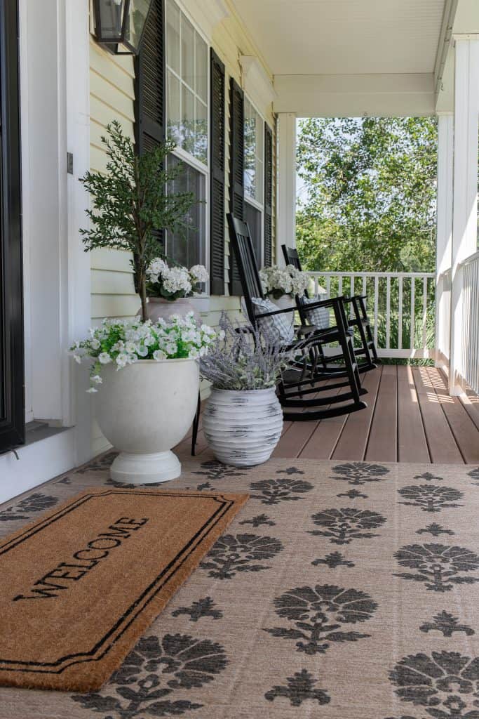 front porch with planters