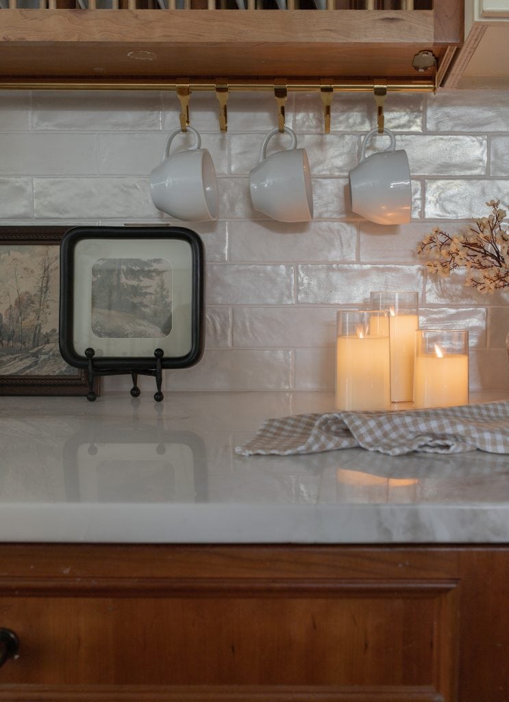 kitchen counter with mugs hanging